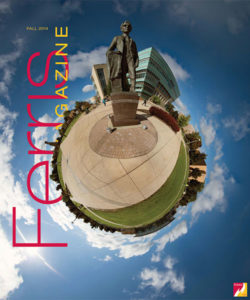 Cover of the Fall 2014 Ferris Magazine, featuring a stylized image of prominent Ferris Big Rapids campus features seen from the quad wrapped in a circle, like a globe, with blue sky and clouds around the edges.
