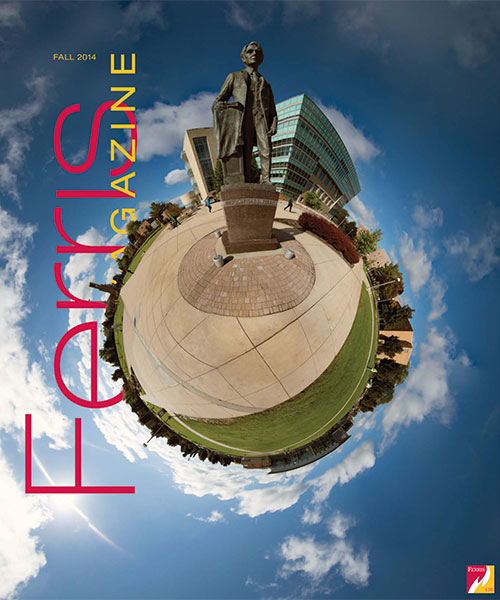Cover of the Fall 2014 Ferris Magazine, featuring a stylized image of prominent Ferris Big Rapids campus features seen from the quad wrapped in a circle, like a globe, with blue sky and clouds around the edges.