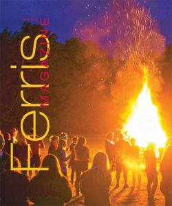 Cover of the Fall 2016 Ferris Magazine, featuring a photo of students and alumni enjoying the bonfire during the fall 2016 homecoming events.